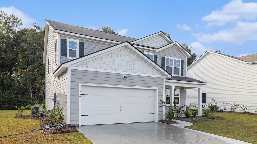 Representative exterior photo of a completed home built from the Plan by D.R. Horton in Hemingway Landing, Conway, SC (Image 17). Representative exterior photo of a completed home built from the Plan by D.R. Horton in Hemingway Landing, Conway, SC (Image 17).