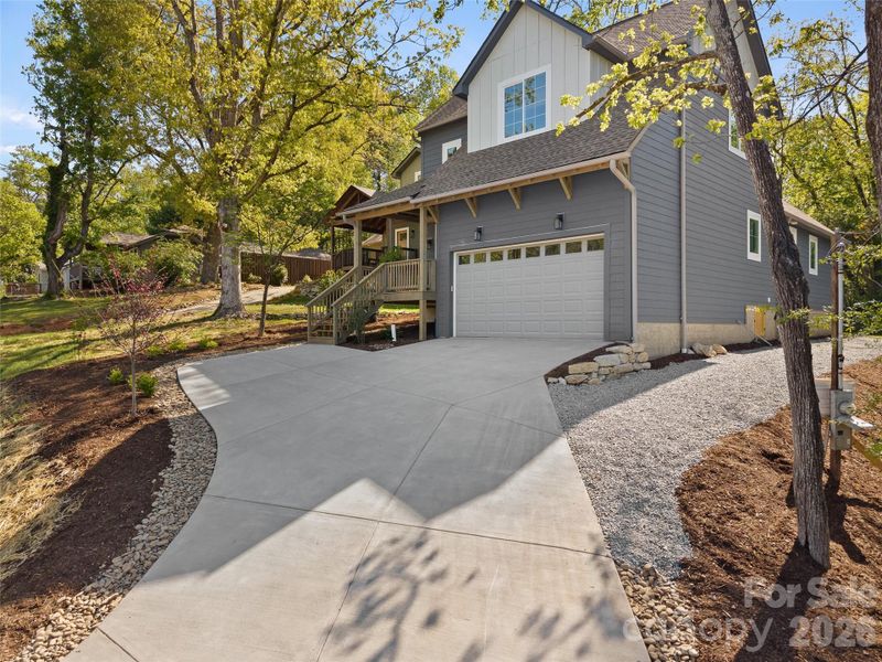 Front exterior of a new home in , Brevard, NC, highlighting curb appeal (Image 23).