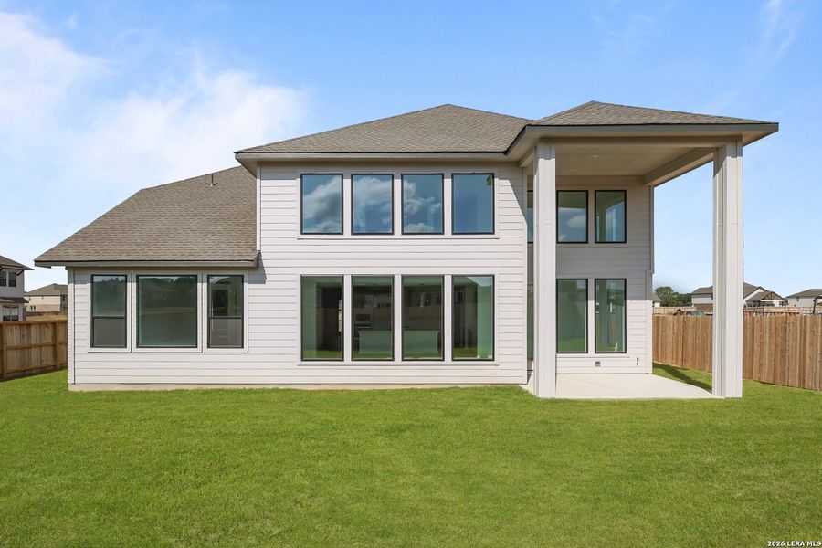 Exterior details and patio area of a home in Megan's Landing, Castroville (Image 4).