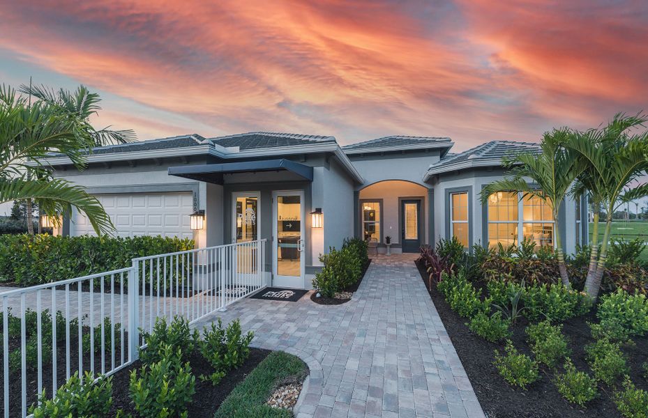 Front exterior of a new home in Highpointe, Stuart, FL, highlighting curb appeal (Image 1). Front exterior of a new home in Highpointe, Stuart, FL, highlighting curb appeal (Image 1).