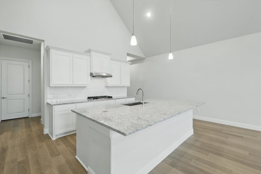 Representative furnished interior of a home built from the Classic Series - Vanderbilt by DRB Homes in Oaks at San Gabriel, Georgetown (Image 37).