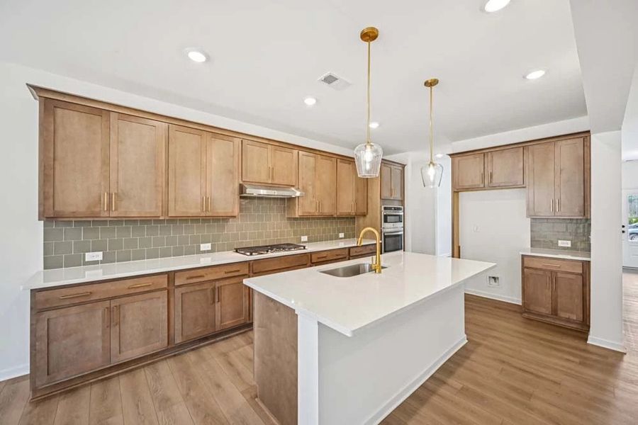 Sample Photo: Kitchen featuring Laguna Collection Finishes