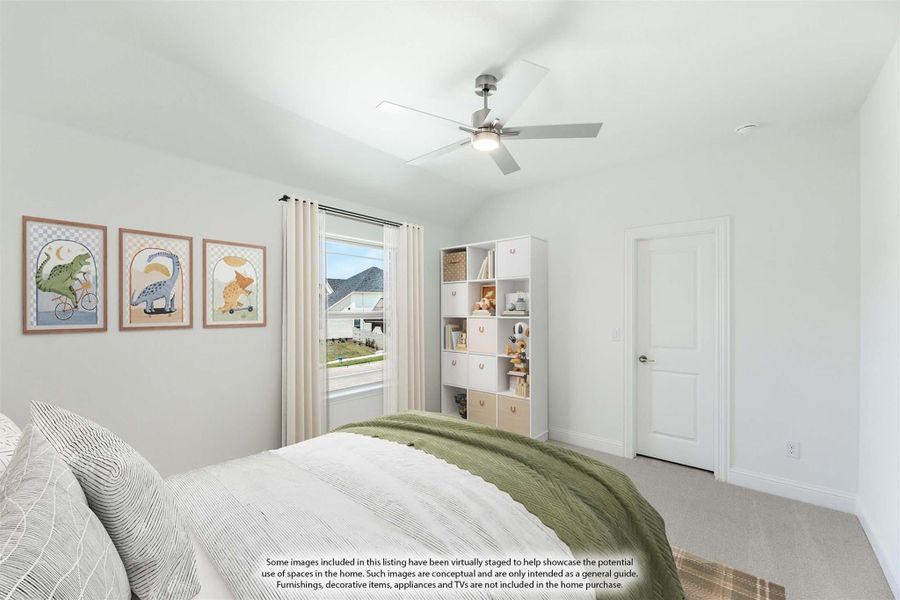 Children's bedroom with vaulted ceiling, ceiling fan, dinosaur wall art, and white cube storage shelving unit.