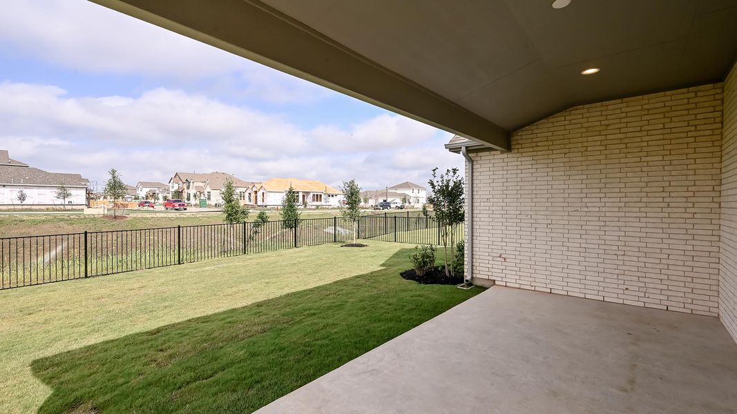 Exterior details and patio area of a home in Flora 50', Hutto (Image 4).