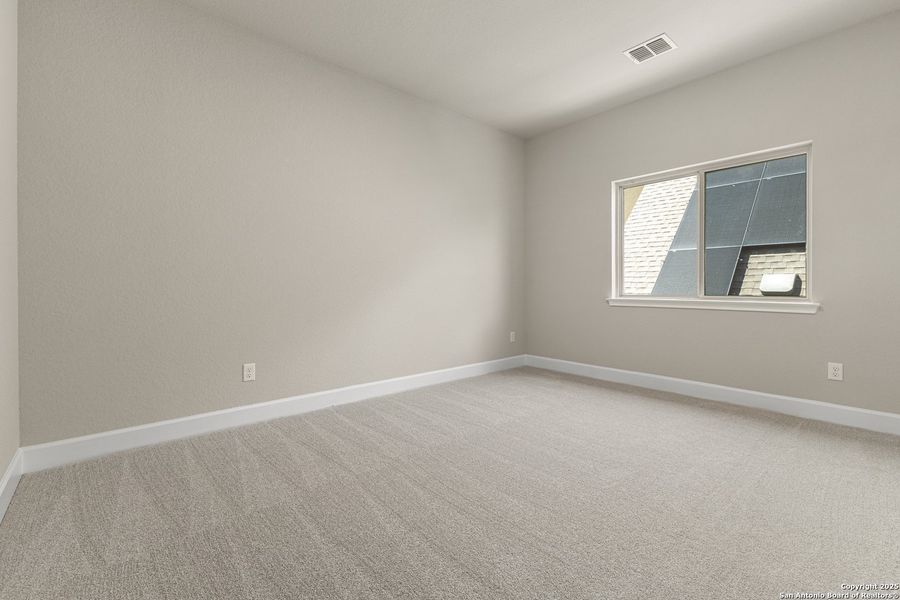 Spacious, unfurnished interior of a new home in The Enclave at Potranco Oaks, Castroville (Image 31).
