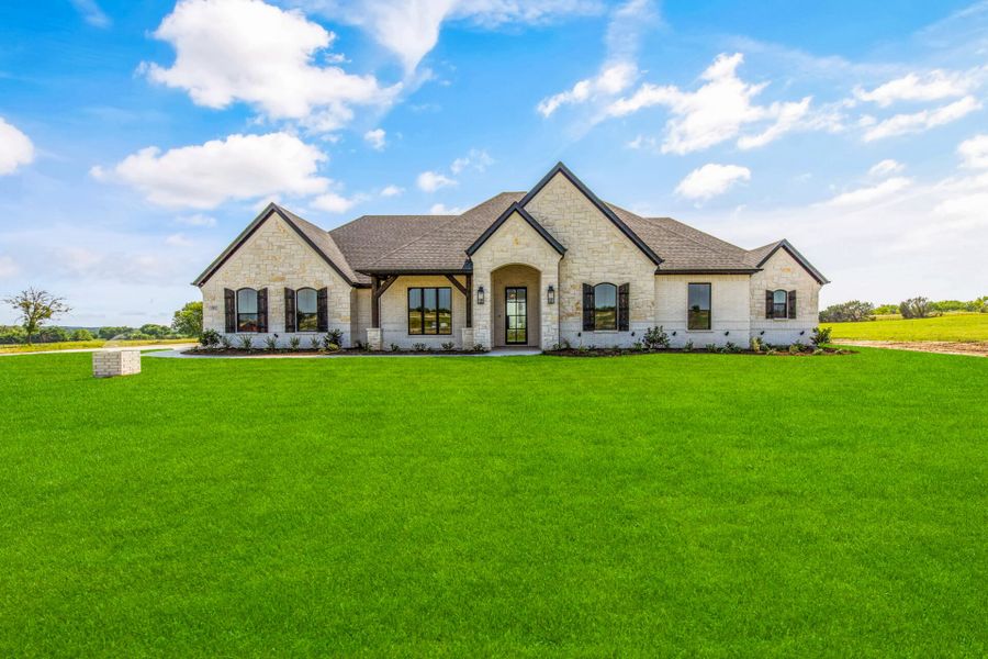 Front exterior of a home in the Pecan Plantation community, located in Granbury, TX (Image 15). Front exterior of a home in the Pecan Plantation community, located in Granbury, TX (Image 15).