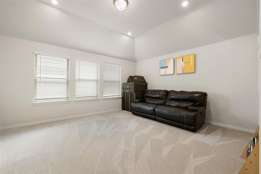 The upstairs game room offers a flexible second living area that works well for movies, studying, or weekend downtime