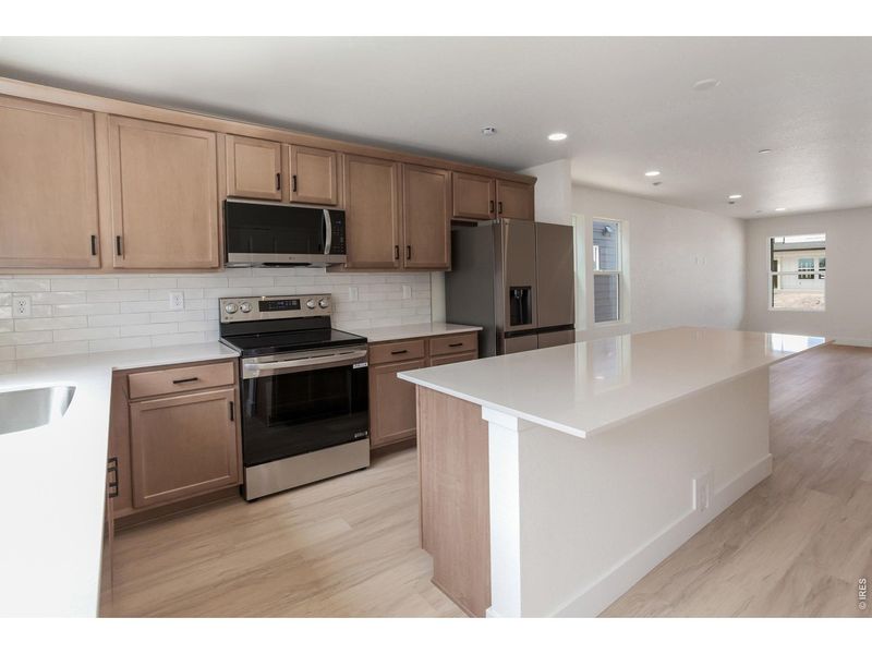 Furnished interior view inside a new home in Prairie Song Story Collection - Single Family Homes, Windsor (Image 17).
