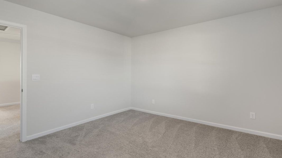 Representative unfurnished interior of a home built from the TILLMAN by D.R. Horton in Surfside Landing, Hubert (Image 50).