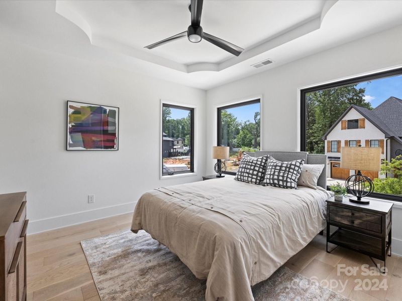 One of the secondary bedrooms with attached bathroom