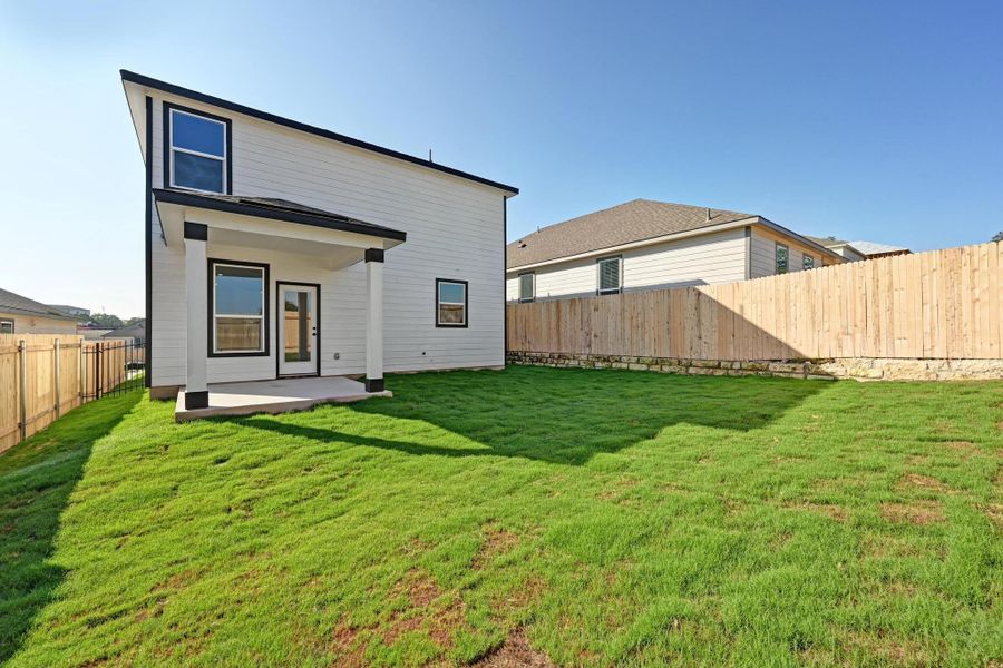 Front exterior of a new home in Creekside at Estancia, Austin, TX, highlighting curb appeal (Image 1). Front exterior of a new home in Creekside at Estancia, Austin, TX, highlighting curb appeal (Image 1).