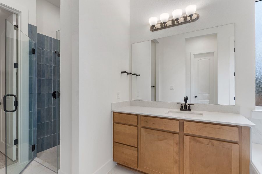 Representative furnished interior of a home built from the Waterville by Ashton Woods in The Trails at Carmel, Pflugerville (Image 12).