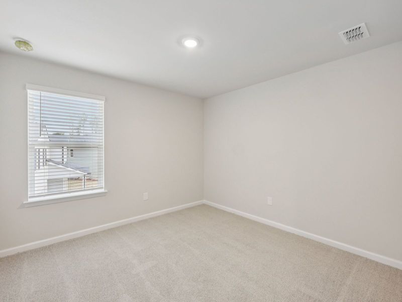 Spacious, unfurnished interior of a new home in Northwoods at Mirror Lake, Villa Rica (Image 19).