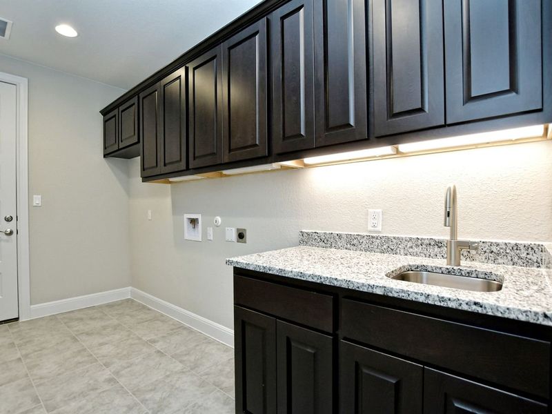 Representative furnished interior of a home built from the Madera II by Giddens Homes in Scofield Farms Estates, Georgetown (Image 233).