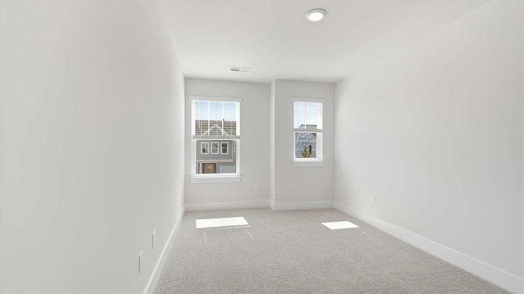 First-class bedroom with generous proportions, a walk-in closet, and beautiful natural light through large windows First-class bedroom with generous proportions, a walk-in closet, and beautiful natural light through large windows