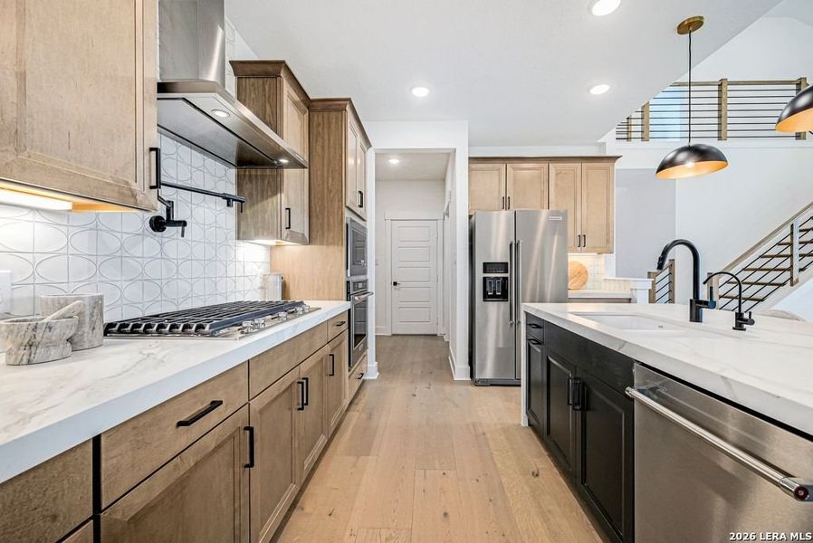 Furnished interior view inside a new home in Nopal Valley, San Antonio (Image 39).