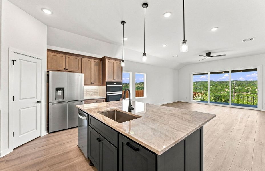Representative furnished interior of a home built from the Elliott by Pulte Homes in West Cypress Hills, Spicewood (Image 6).