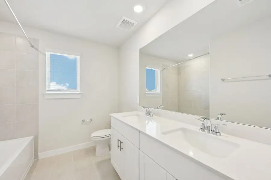 Furnished interior view inside a new home in Pine Lake Cove - Traditional Series, Montgomery (Image 9).