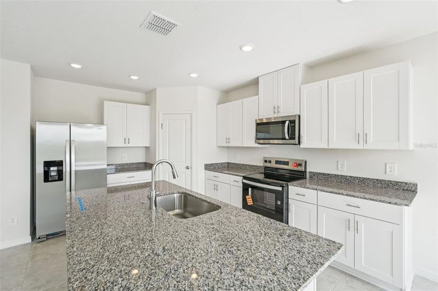 Furnished interior view inside a new home in Crosswinds - Signature Series, Haines City (Image 11).