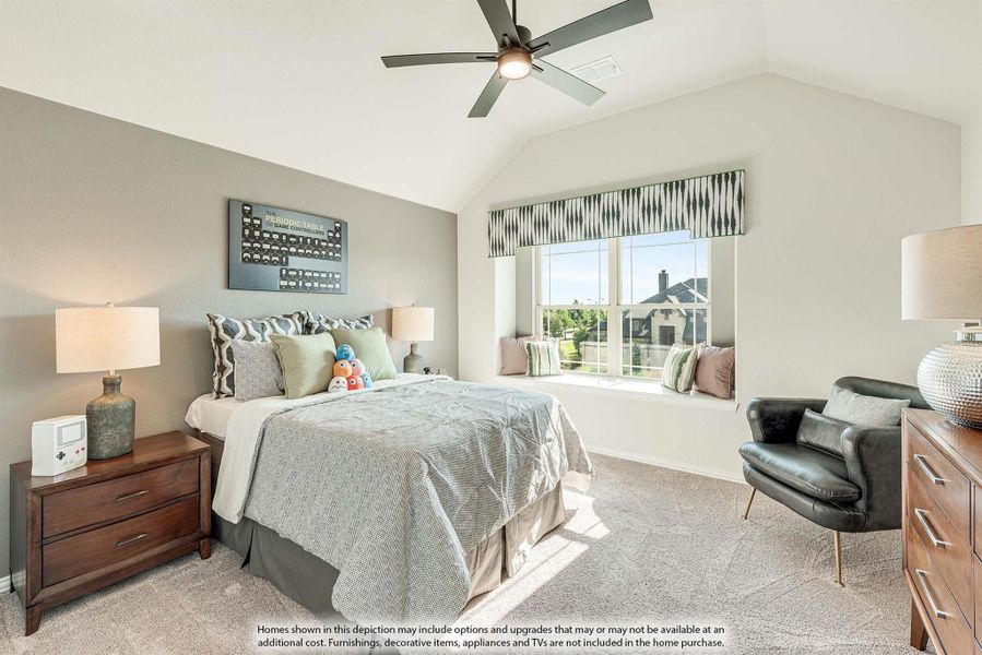 Bedroom with vaulted ceiling, ceiling fan, window seat, and carpet flooring
