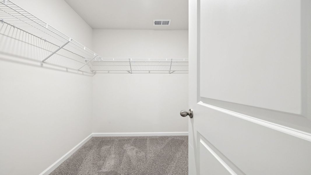 Spacious, unfurnished interior of a new home in Bentley Park, Greenwood (Image 30).