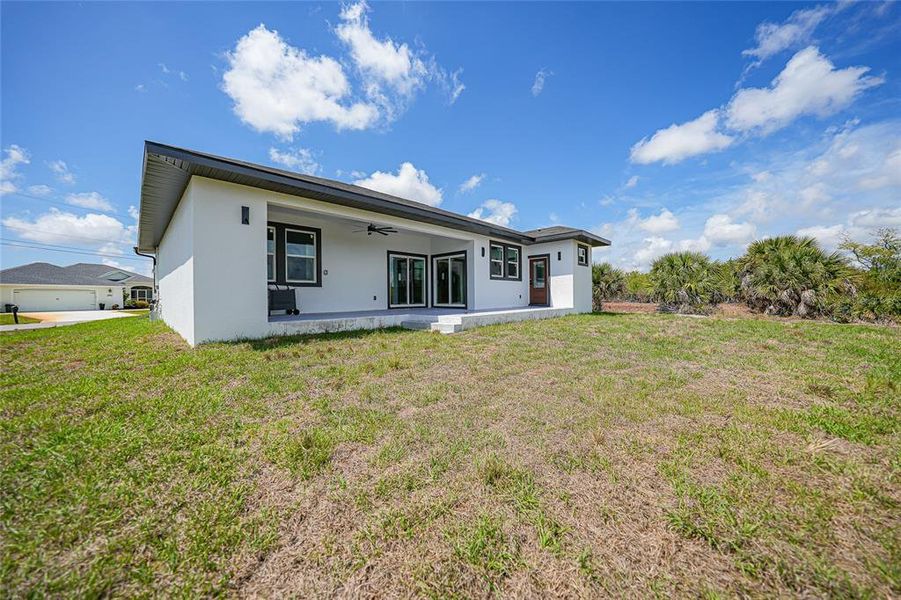 Exterior details and patio area of a home in , Port Charlotte (Image 32).