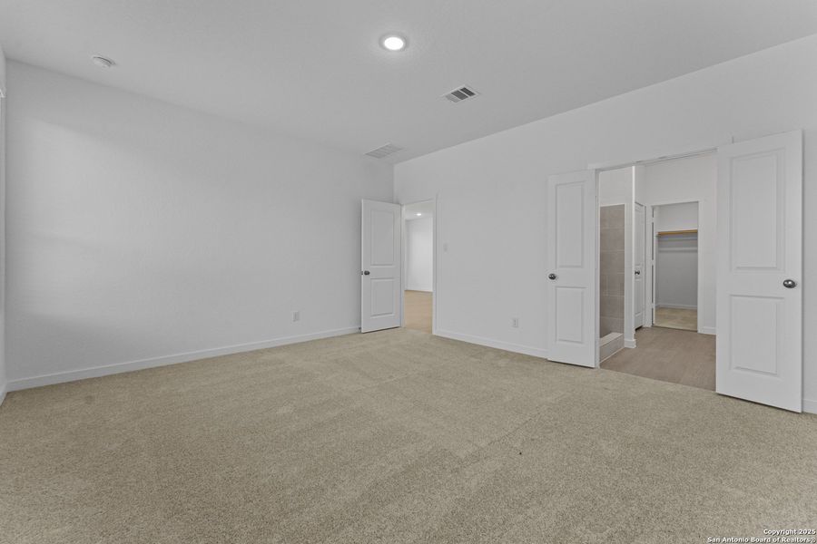 Spacious, unfurnished interior of a new home in Waterwheel: Coastline Collection, San Antonio (Image 10).