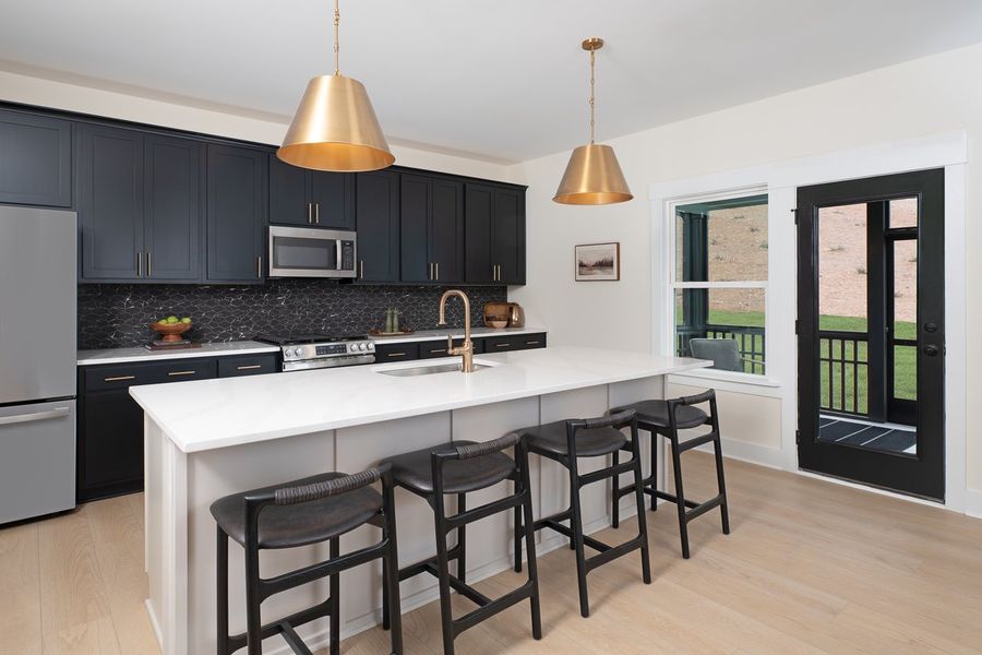 Representative furnished interior of a home built from the Knox by Ashton Woods in Rowland's Grant, Fuquay Varina (Image 5).