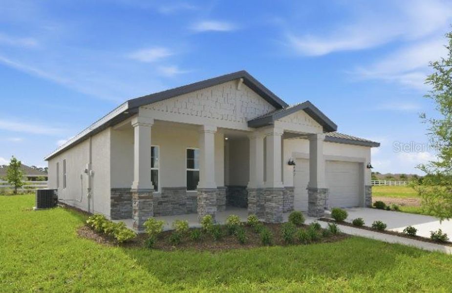 Front exterior of a new home in Tyson Reserve, St. Cloud, FL, highlighting curb appeal (Image 17).