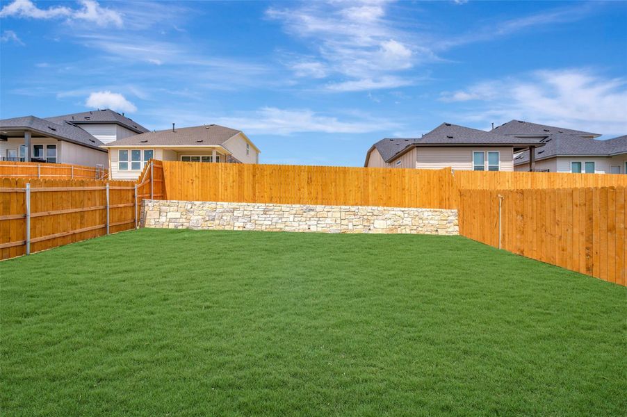 Exterior details and patio area of a home in Heritage, Dripping Springs (Image 3).