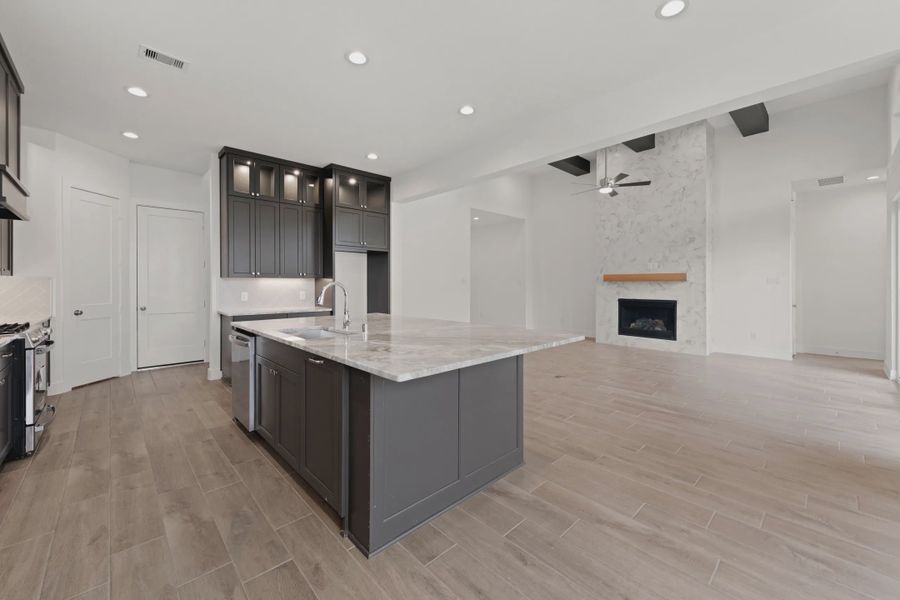 Representative furnished interior of a home built from the Rollins by Chesmar Homes in Gregg Ranch, Marble Falls (Image 5).