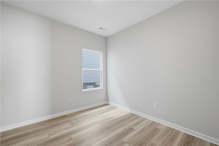 Spacious, unfurnished interior of a new home in The Bluffs, Canton (Image 19).