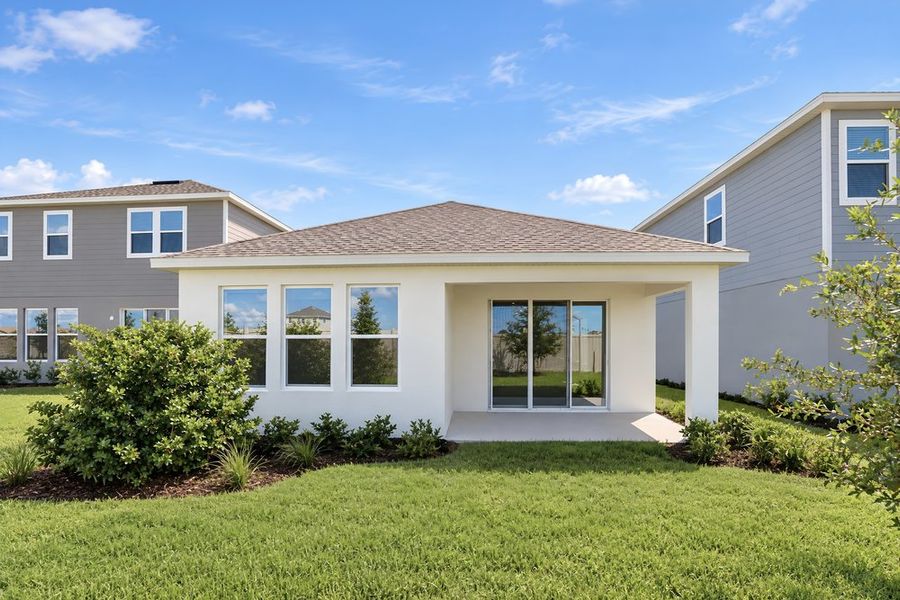 Exterior details and patio area of a home in Lochside, Mount Dora (Image 27). Exterior details and patio area of a home in Lochside, Mount Dora (Image 27).