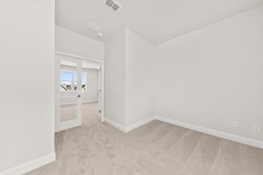 Representative unfurnished interior of a home built from the Royston by Pulte Homes in Point Hope, Charleston (Image 11).
