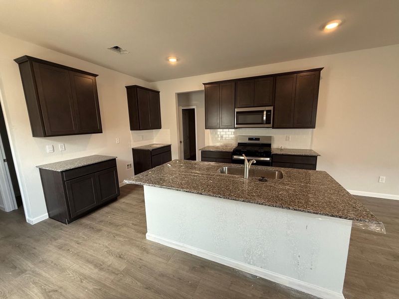 Furnished interior view inside a new home in Midtown Reserve, College Station (Image 3).