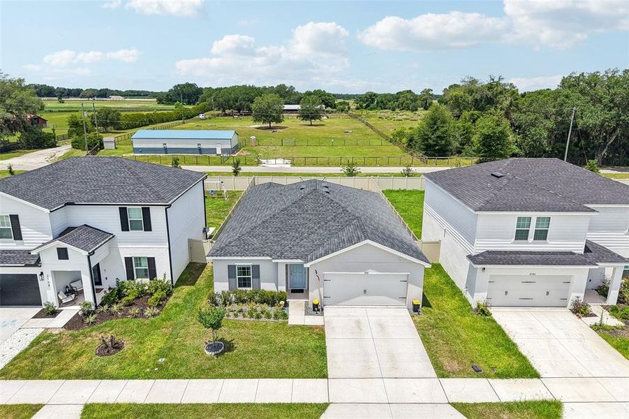 Front exterior of a new home in , Sumterville, FL, highlighting curb appeal (Image 22).