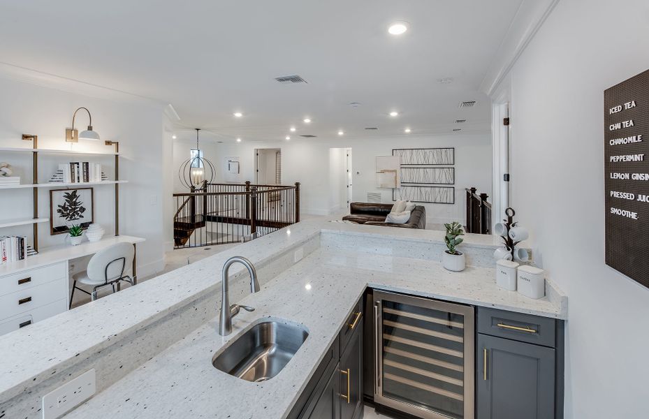 Representative furnished interior of a home built from the Sanibel by DiVosta in Orchid Isles, Palm Beach Gardens (Image 15).