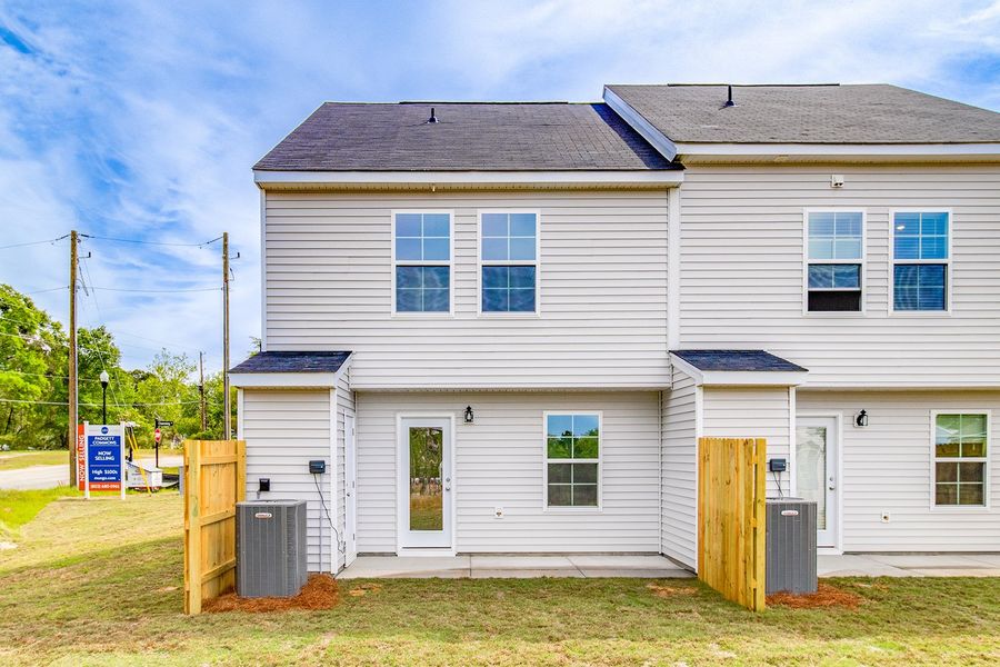 Exterior details and patio area of a home in Padgett Commons, Hopkins (Image 4).