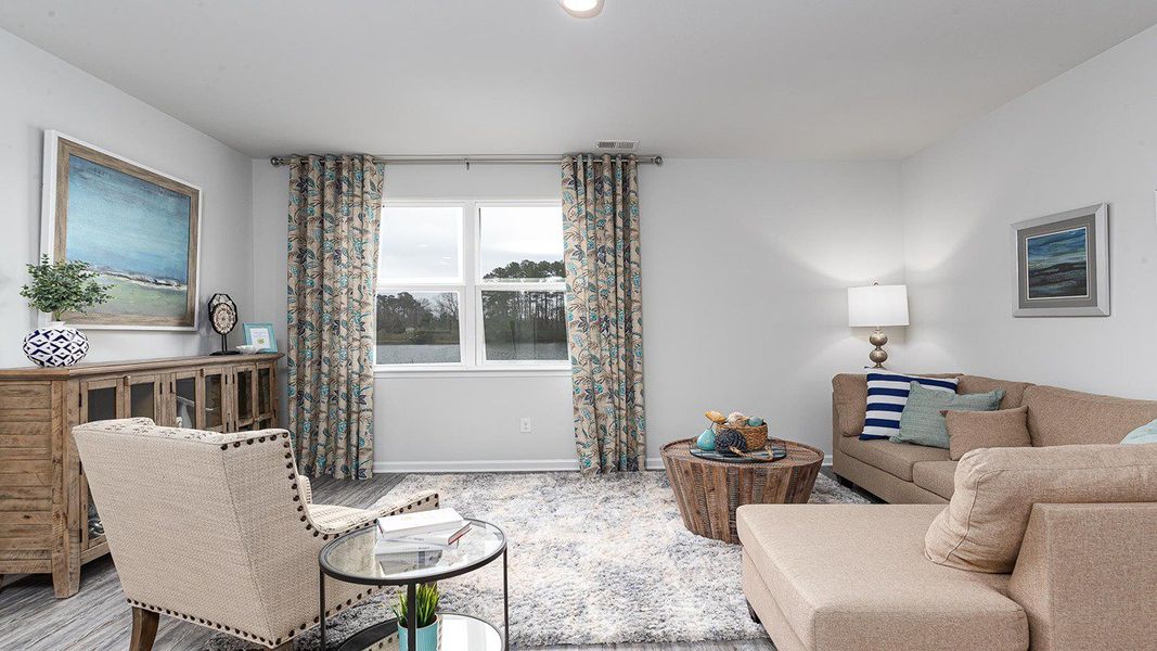 Furnished interior view inside a new home in Stanbury Creek, Supply (Image 7).
