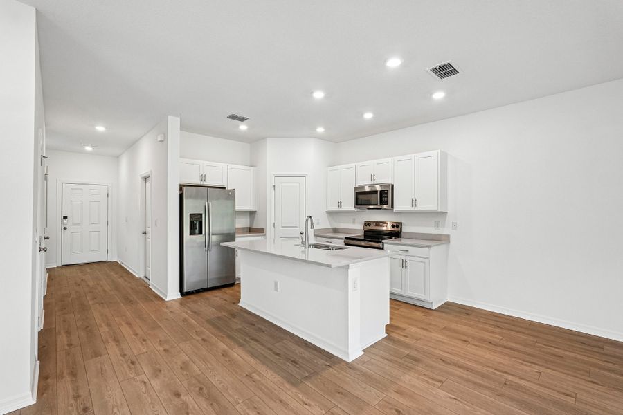 Furnished interior view inside a new home in The Towns at Tiburon, Nokomis (Image 6).