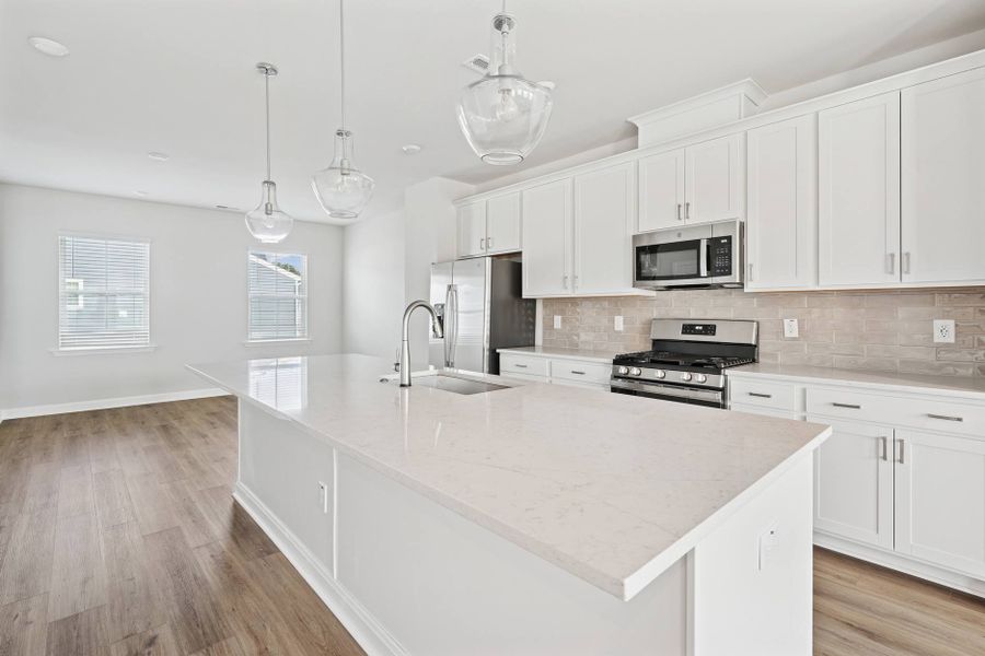 Representative furnished interior of a home built from the Holden by Tri Pointe Homes in Mews at Holding Village, Wake Forest (Image 6).
