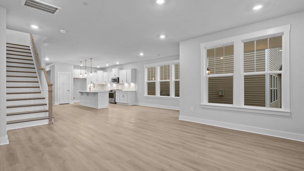 Superior design shines in this open-concept family room with timeless finishes and a modern edge Superior design shines in this open-concept family room with timeless finishes and a modern edge