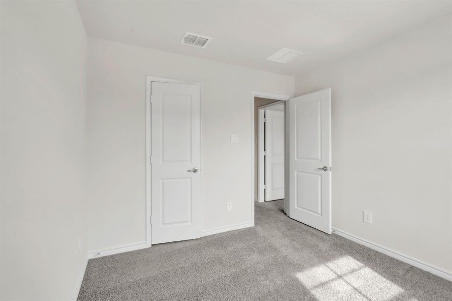 Spacious, unfurnished interior of a new home in The Landing at Hidden Lakes, McKinney (Image 24).