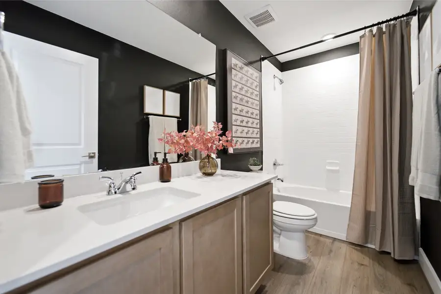 Representative furnished interior of a home built from the Willow by CastleRock Communities in Katzer Ranch, Converse (Image 37).