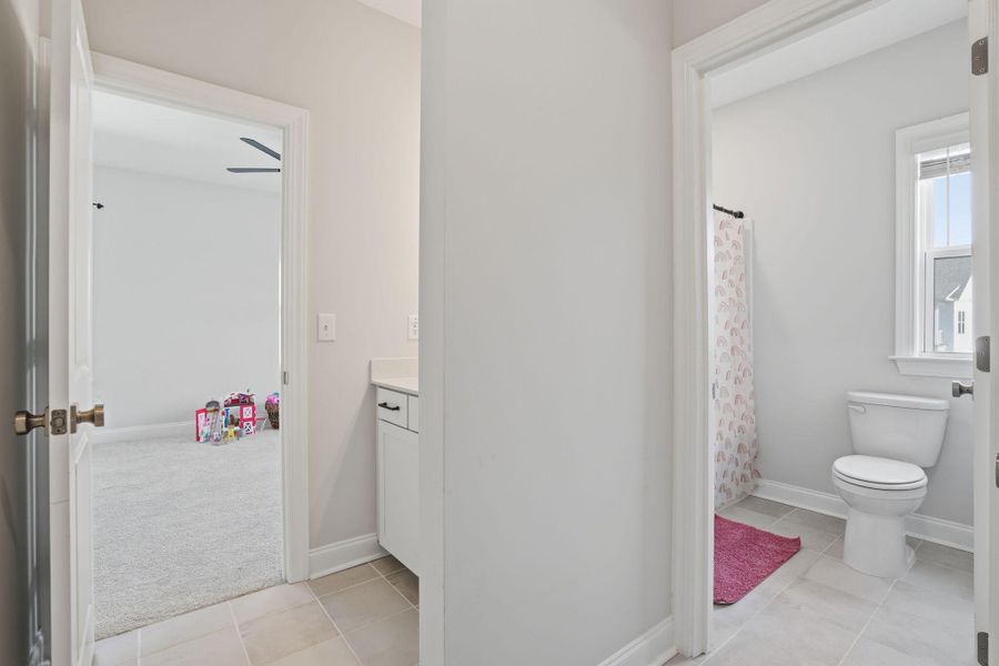 Furnished interior view inside a new home in Tidewater at Lakes of Cane Bay, Summerville (Image 40).