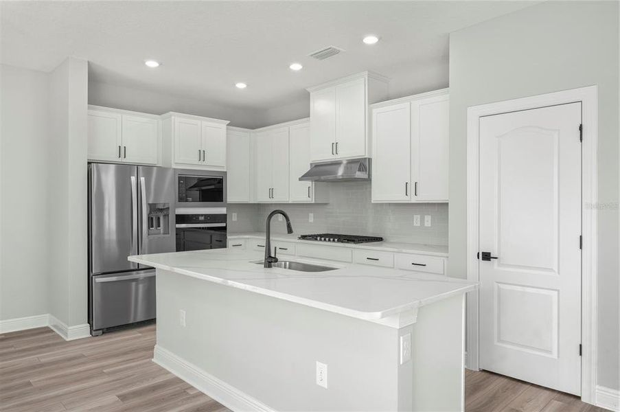 Furnished interior view inside a new home in Reunion Village, Kissimmee (Image 2). Furnished interior view inside a new home in Reunion Village, Kissimmee (Image 2).