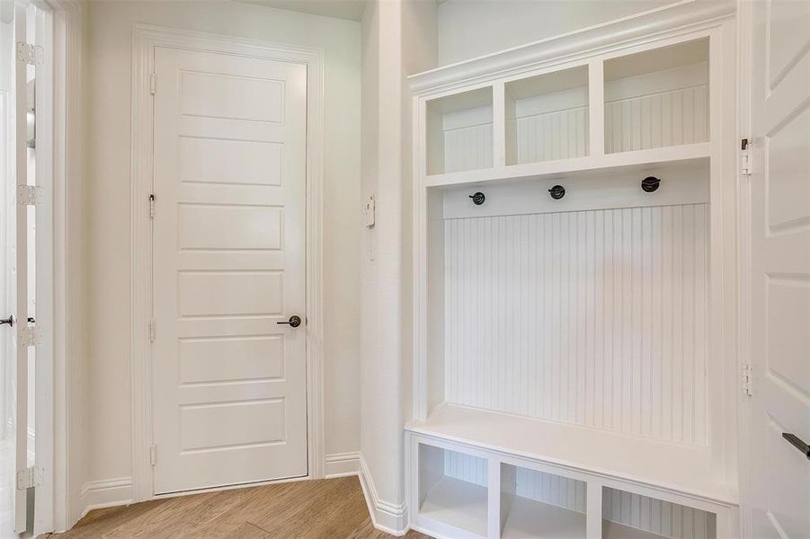 Mudroom featuring light hardwood / wood-style floors