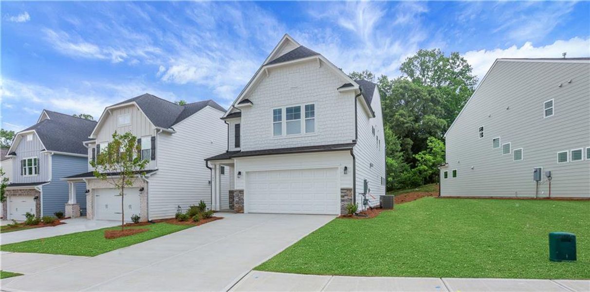 Front exterior of a new home in Villas at Dawsonville, Dawsonville, GA, highlighting curb appeal (Image 26).