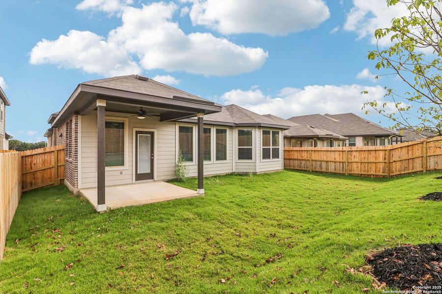 Exterior details and patio area of a home in Fox Falls, Boerne (Image 21).