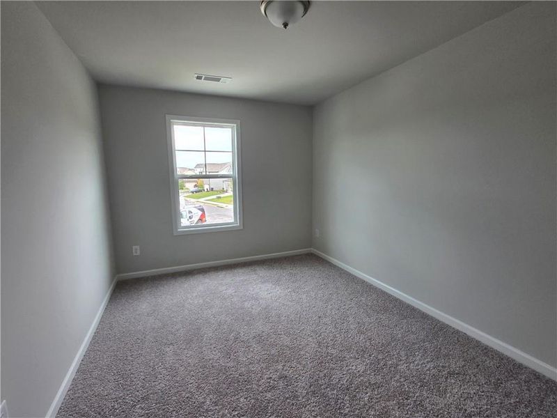 Spacious, unfurnished interior of a new home in Enclave at Logan Point, Loganville (Image 32).